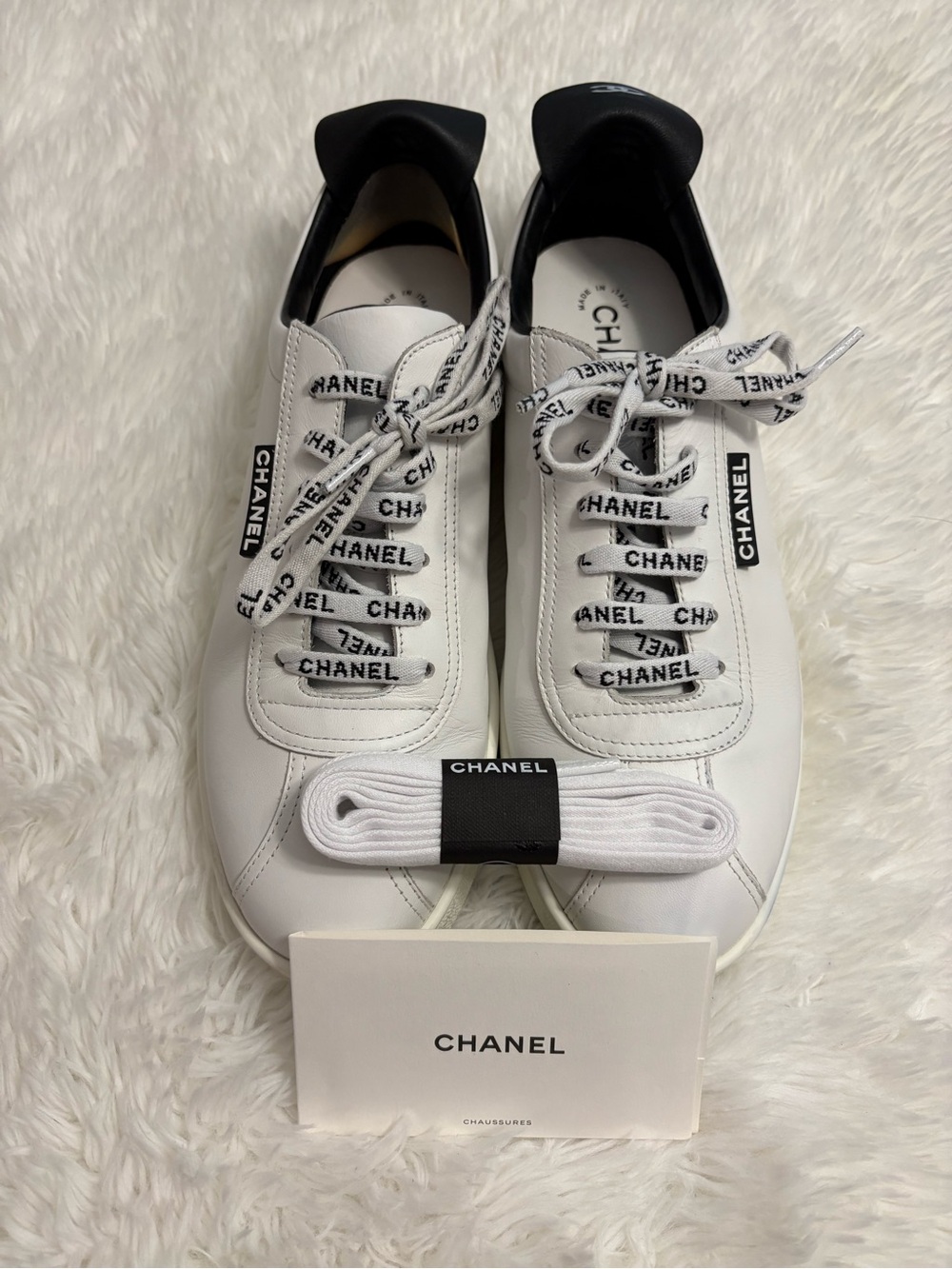 CHANEL White and Black Logo Lace-Up Sneakers